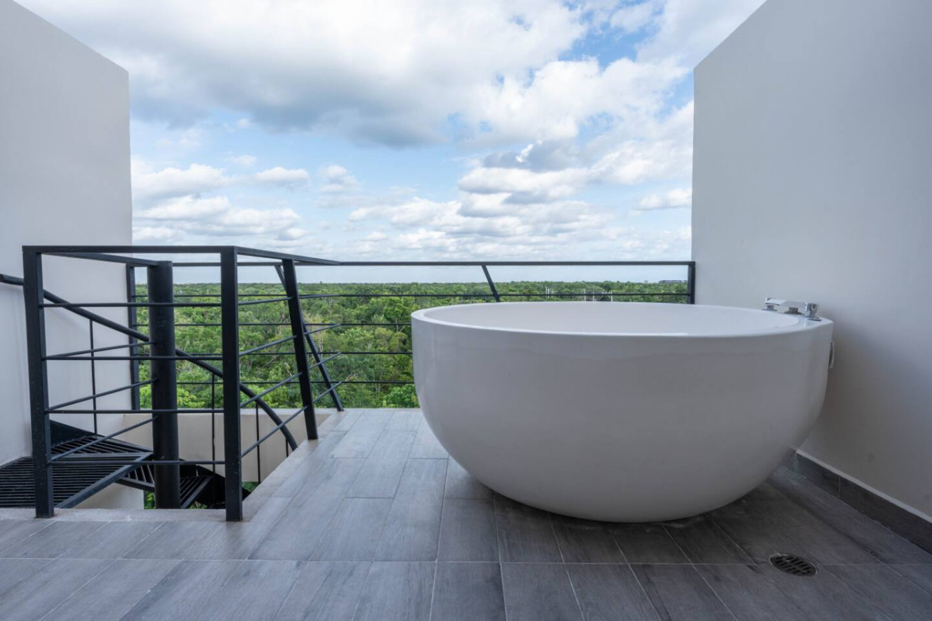 Take your Tulum stay to the next level with a private rooftop oasis featuring a luxurious jacuzzi. Soak in the views, relax in warm waters, and enjoy your own slice of paradise—book now for the ultimate escape!