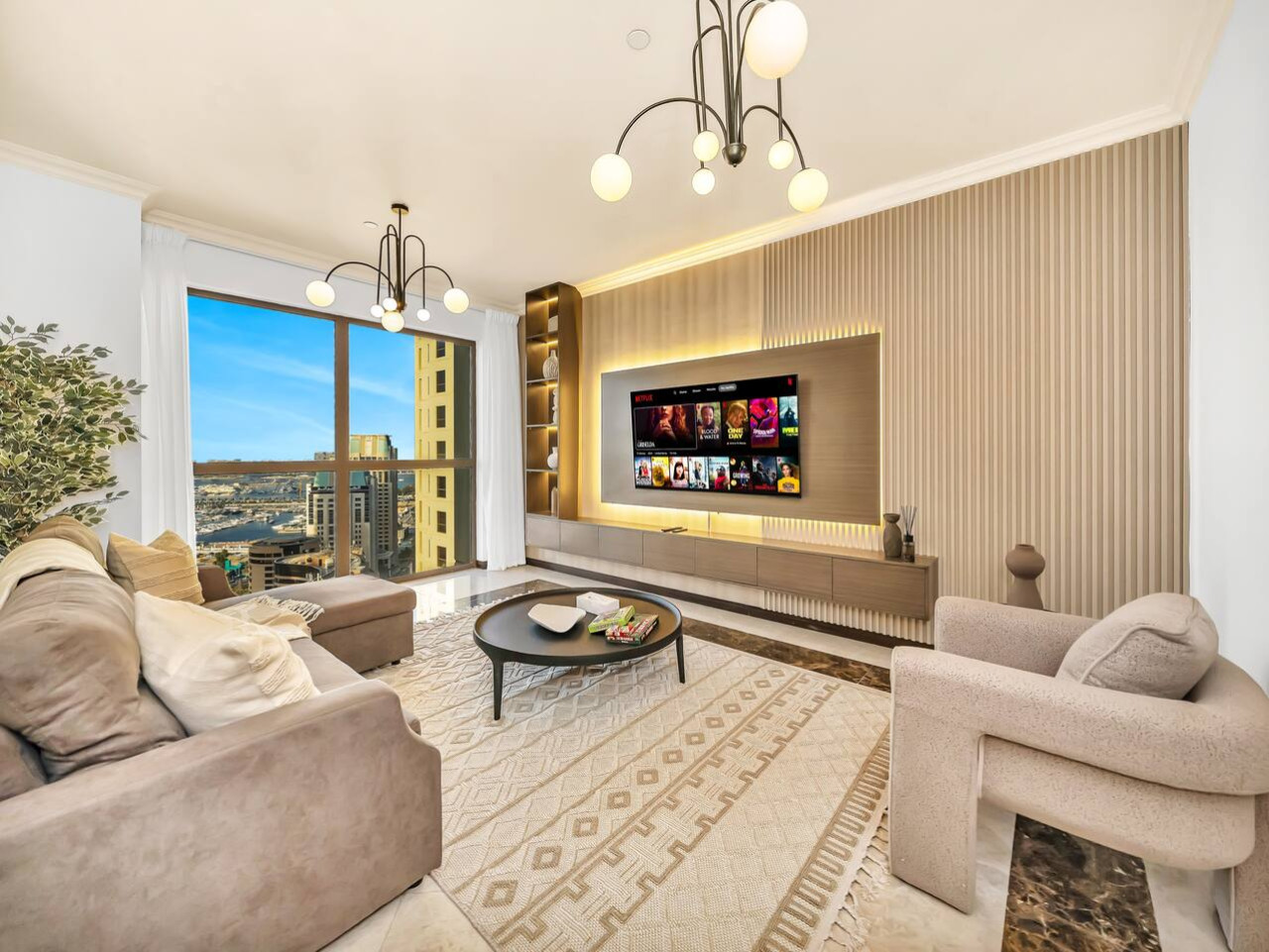 Step into a haven of modern elegance, where city views meet plush comfort.