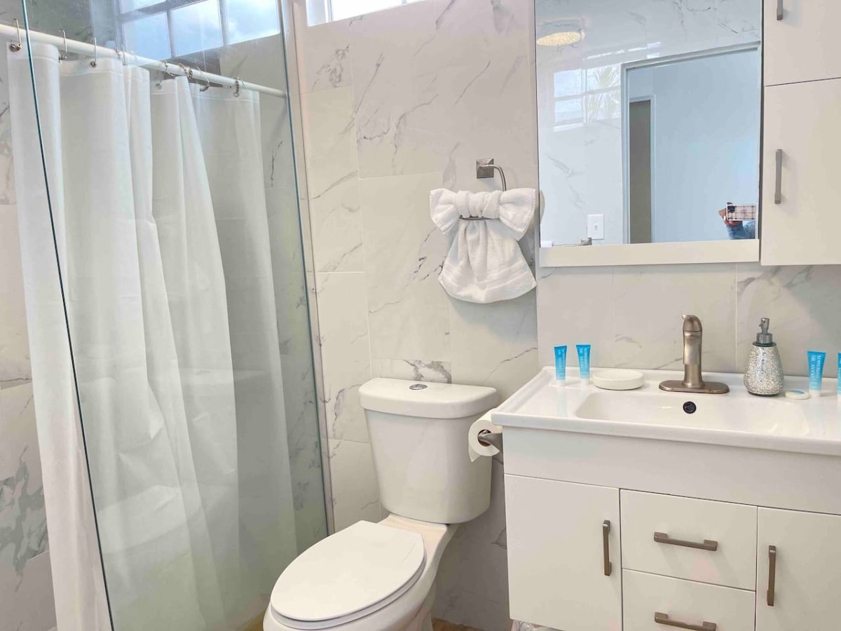 Bathroom: Sleek marble finishes and modern fixtures create a perfect retreat for relaxation!
