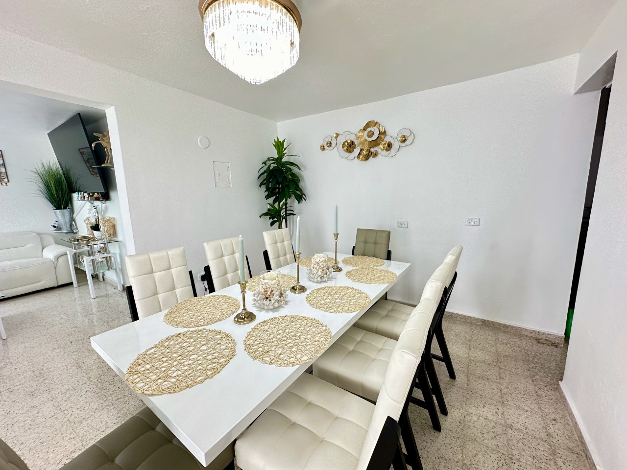 Dining Room: Elegant ambiance with chic seating and artistic decor awaits your culinary adventures!