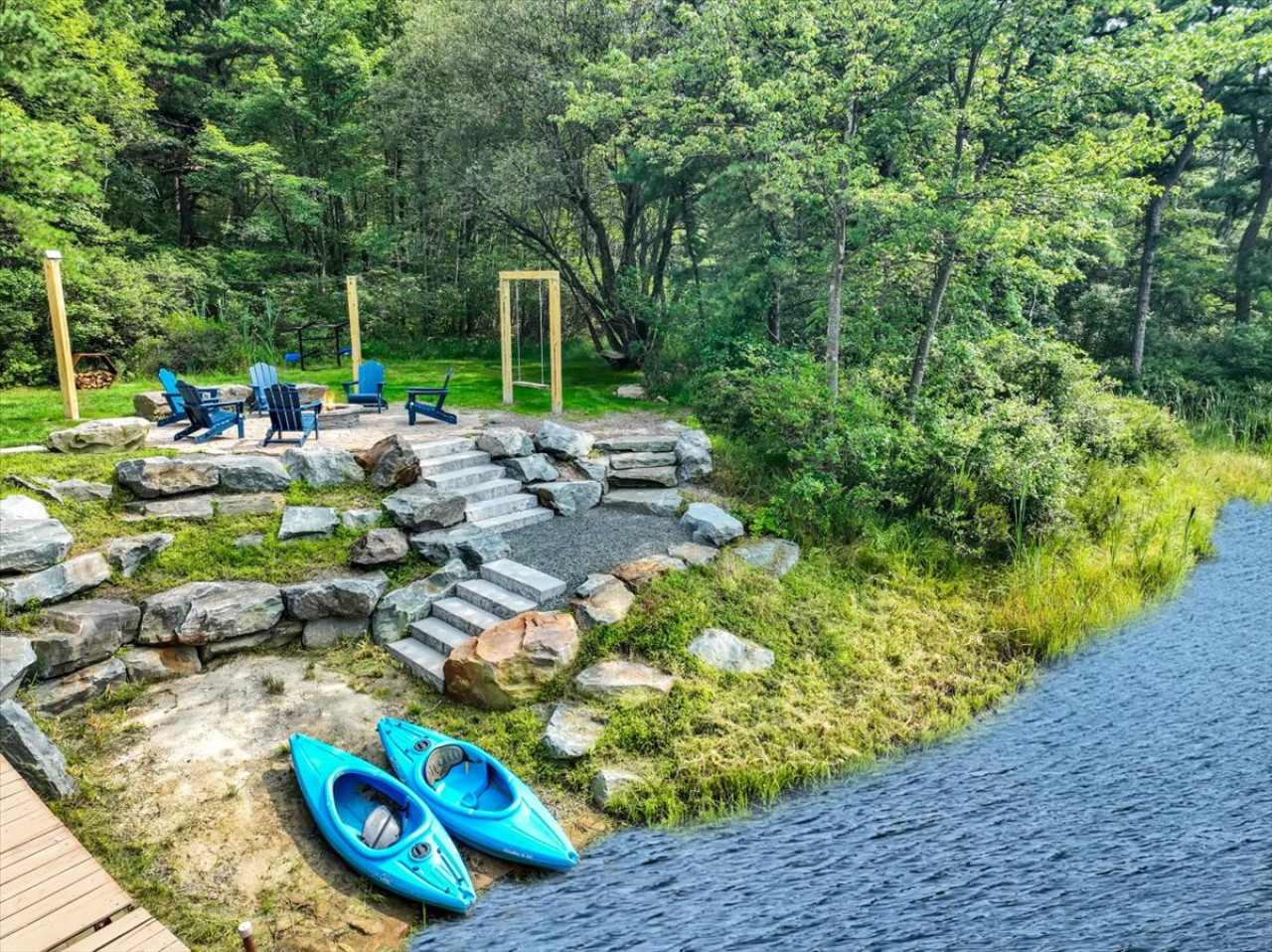 Two kayaks waiting lakeside — launch right from your private dock for a day of adventure! 🛶✨