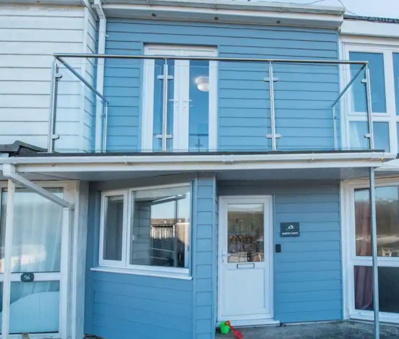 Charming Beach Chalet with Balcony & Sea Views