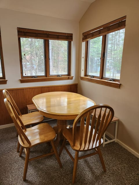 A dining area that seats 6. The table is the perfect place to enjoy a lovely meal or play a game. A highchair/boost seat is available at the unit at all times for our youngest guests. Highchair can be found in closet with a selection of board games.