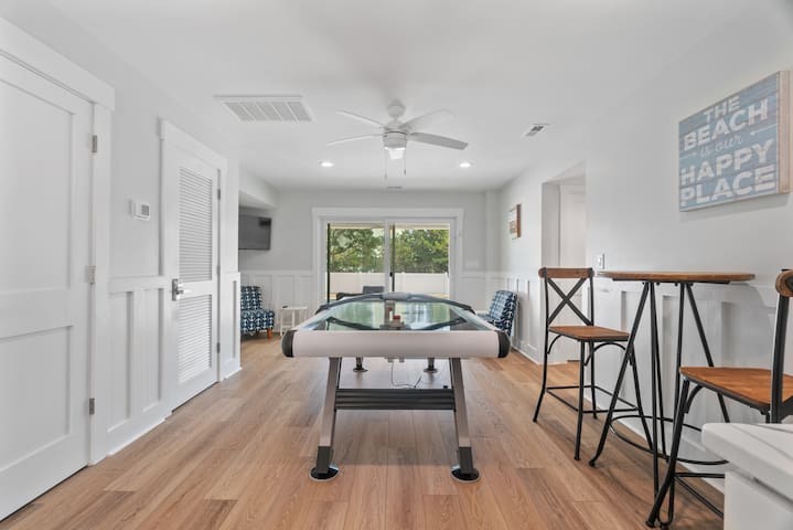 1st floor gathering room leading out to the pool area