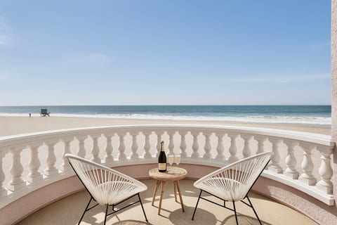 Cheers the perfect day on your third floor balcony