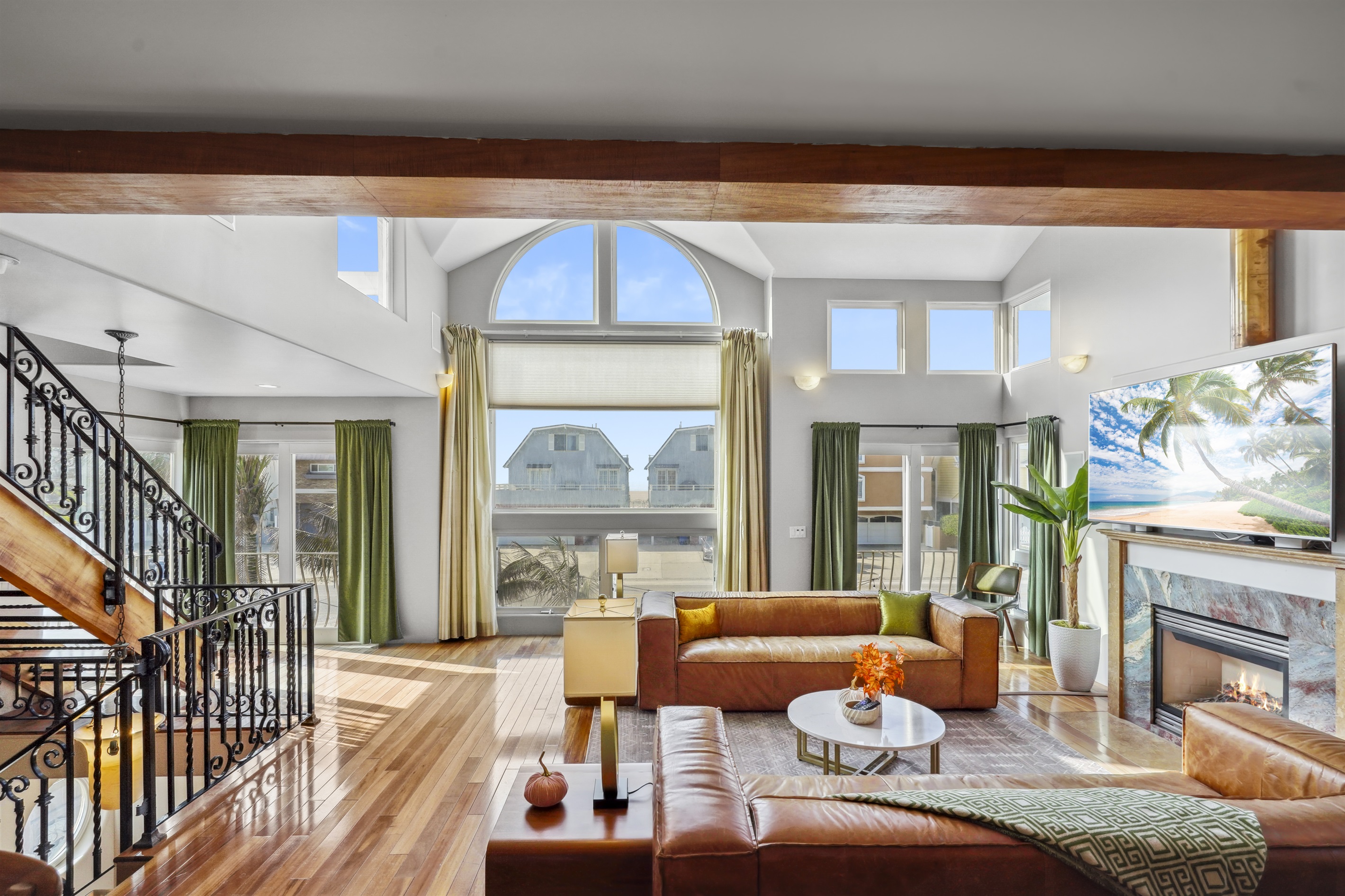 Gaze out the large picture window with a peek of the ocean—just across the street!