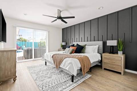Relax in the Master bedroom with access to the backyard & spa. Ensuite bathroom and walk-in closet.