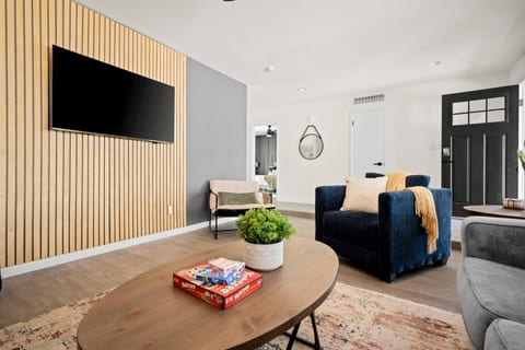 Relax and gather with friends and family in the cozy living room equipped with Roku.