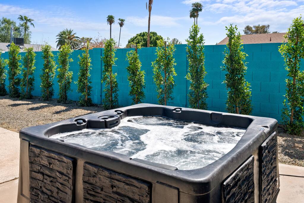 Resort backyard with pool, spa, BBQ and gas firepit