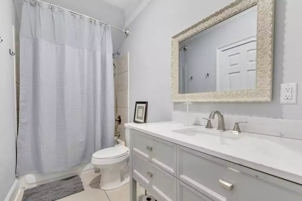 Ensuite Bathroom (with bedroom & hallway access for 3Queen Room) - Luxury in the City: Charlotte Vacation Rental - Charlotte