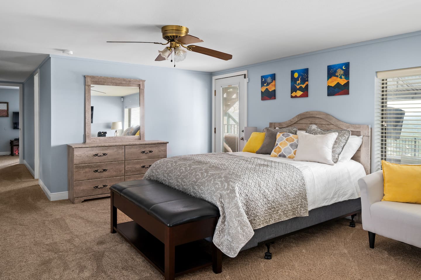Downstairs primary quarters comes with full bathroom and leads to the bunk room  - Infinite Views, Heated Pool, Hill Country Paradise! - Canyon Lake