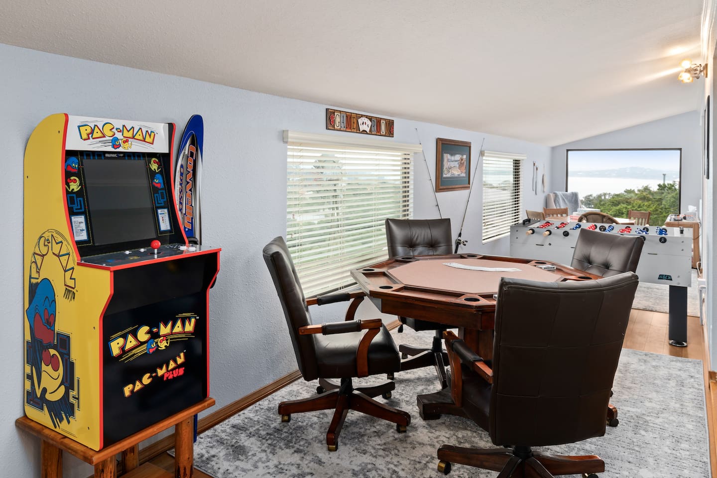 Game room! Pac-man, poker/card table, foosball - plenty of fun for all! - Infinite Views, Heated Pool, Hill Country Paradise! - Canyon Lake