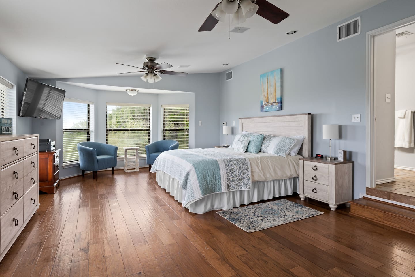 Mid-level primary with ensuite full bathroom - Infinite Views, Heated Pool, Hill Country Paradise! - Canyon Lake