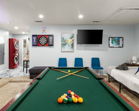 "Challenge friends to pool showdowns while sports play on the wall-mounted TV – winner gets to pick tomorrow's adventure!