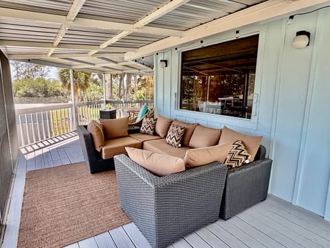 sit back and relax on this cozy porch