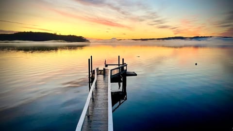 Wake up to this view of the water and mountains in the distance!