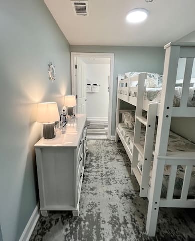 Bunk room area with bunk beds.