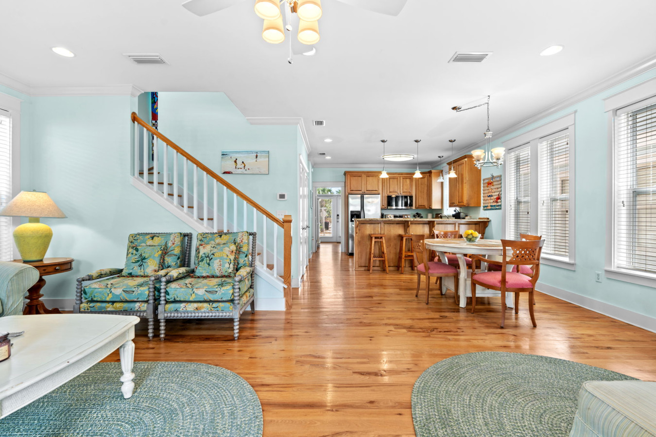 Enjoy the open-concept layout with beachy decor, a fully equipped kitchen, and plenty of space to gather with family and friends.