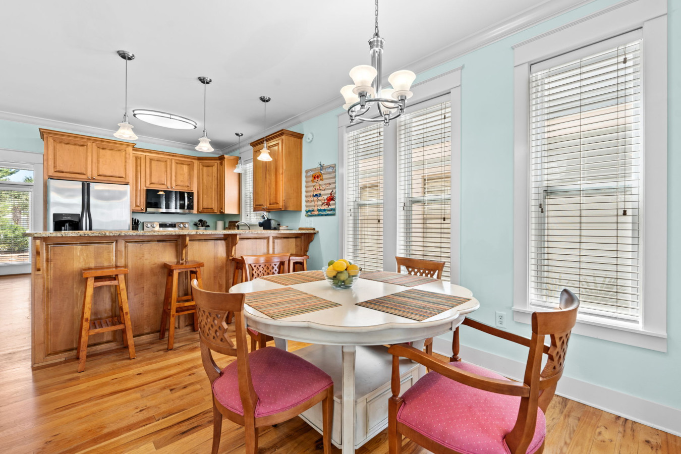 Share meals around the bright and charming dining table or grab a seat at the kitchen bar in this well-equipped open-concept space.