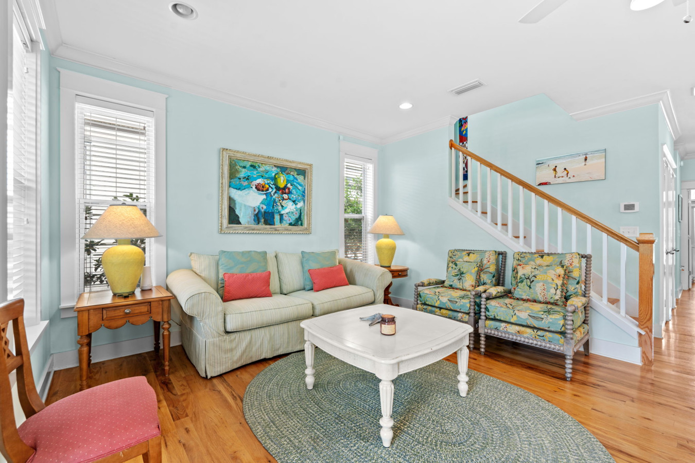 Enjoy the open-concept layout with beachy decor, a fully equipped kitchen, and plenty of space to gather with family and friends.