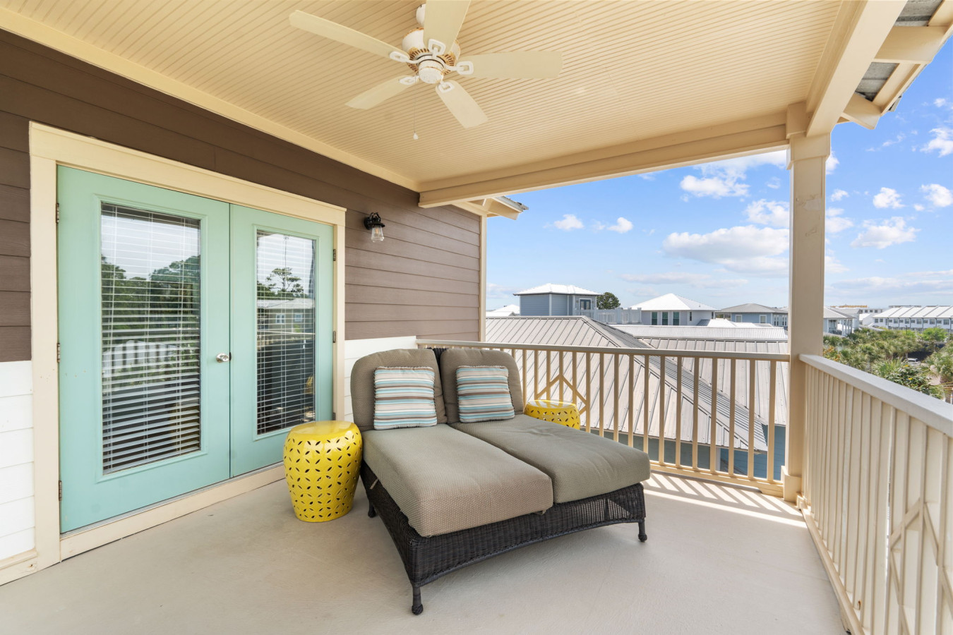 ick back on the plush double lounger under a ceiling fan on the spacious third-story balcony.