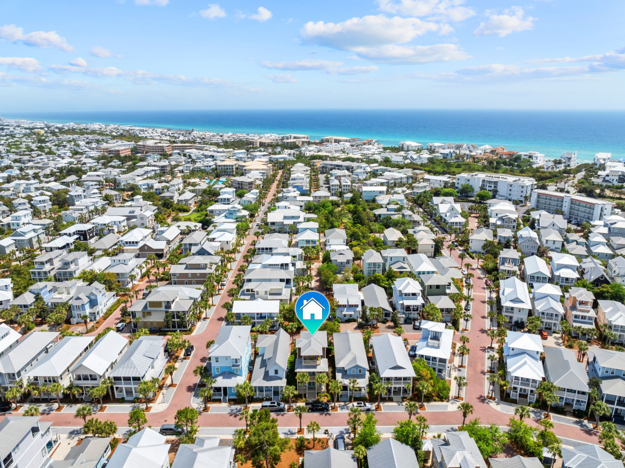 This aerial shot highlights how close you’ll be to the beach in the heart of a vibrant coastal community.