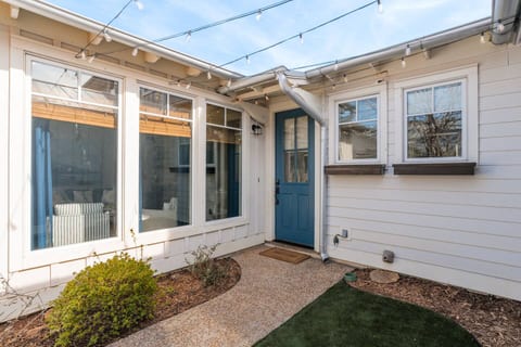 Front entry and courtyard with string lights