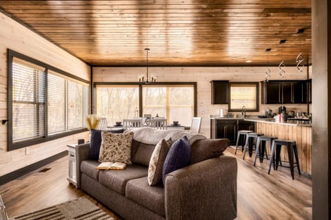 An open layout plan creating a large, inviting space as well as allowing natural light in the room.