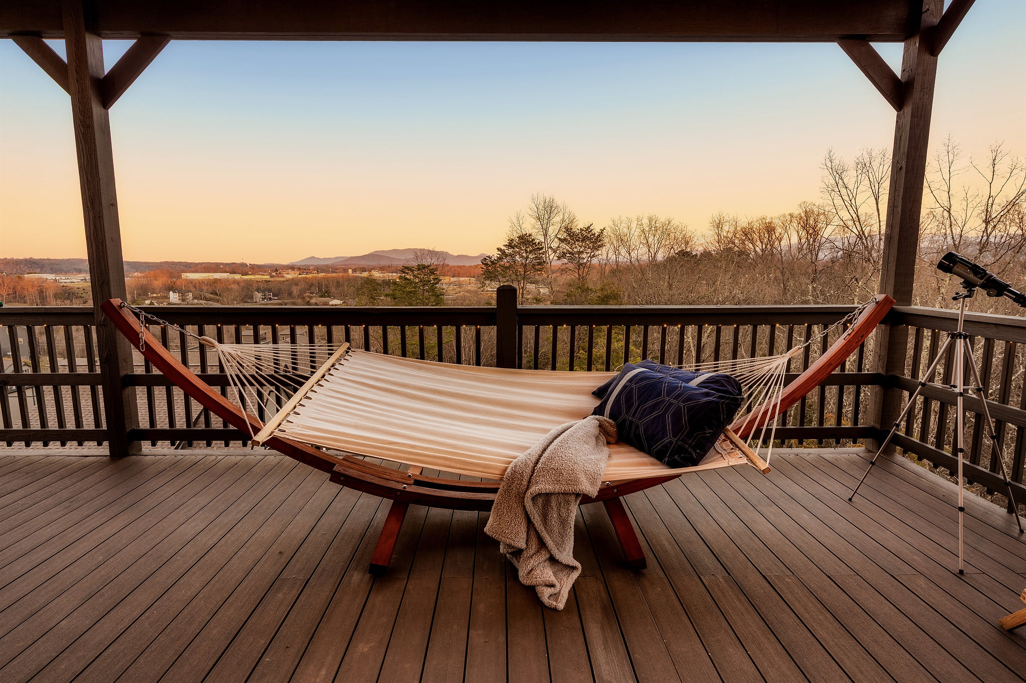 Get cozy in this hammock on the third floor Skydeck with relaxing mountain views!