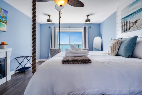 Master Bedroom with access to second story balcony with calming lake views