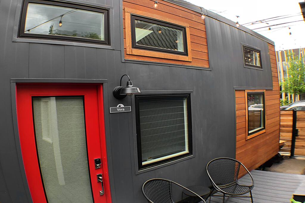 The Vera sits on the end of the other two tiny homes in Slabtown Village. At 20' long, the Vera is the biggest of the tiny homes.