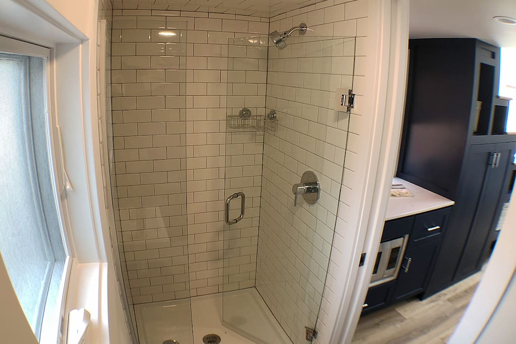 A full-size tile shower.