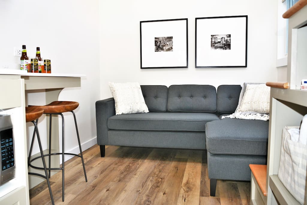 Large L-Shaped couch for lounging.