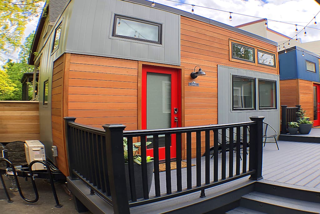Large deck with chairs and table.