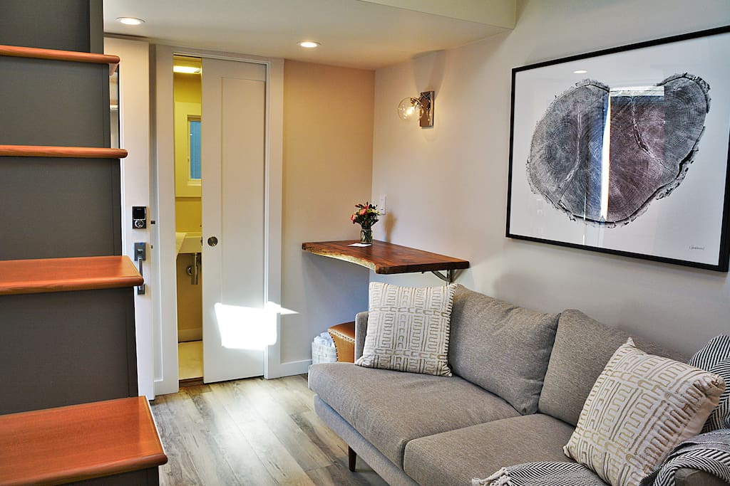 A "Slab" table along with custom wood artwork holds true to its namesake.