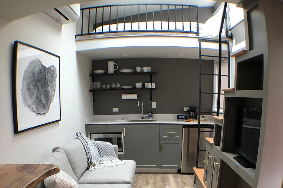A second loft over the top of the kitchen with full-size bed.
