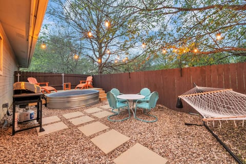 A small cowboy pool and deck in the backyard with a grill, the perfect addition to your outdoor retreat.