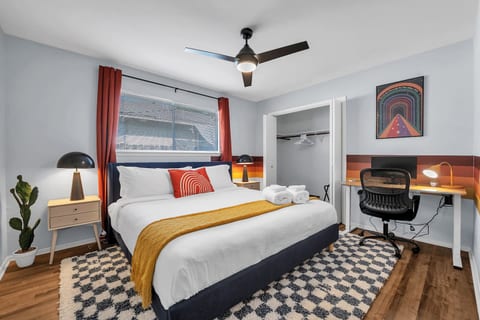 Step back in time with this groovy 1970s-inspired bedroom and workspace combo!