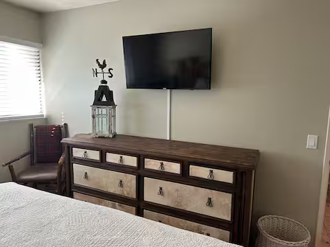 Dresser and tv in masterbedroom