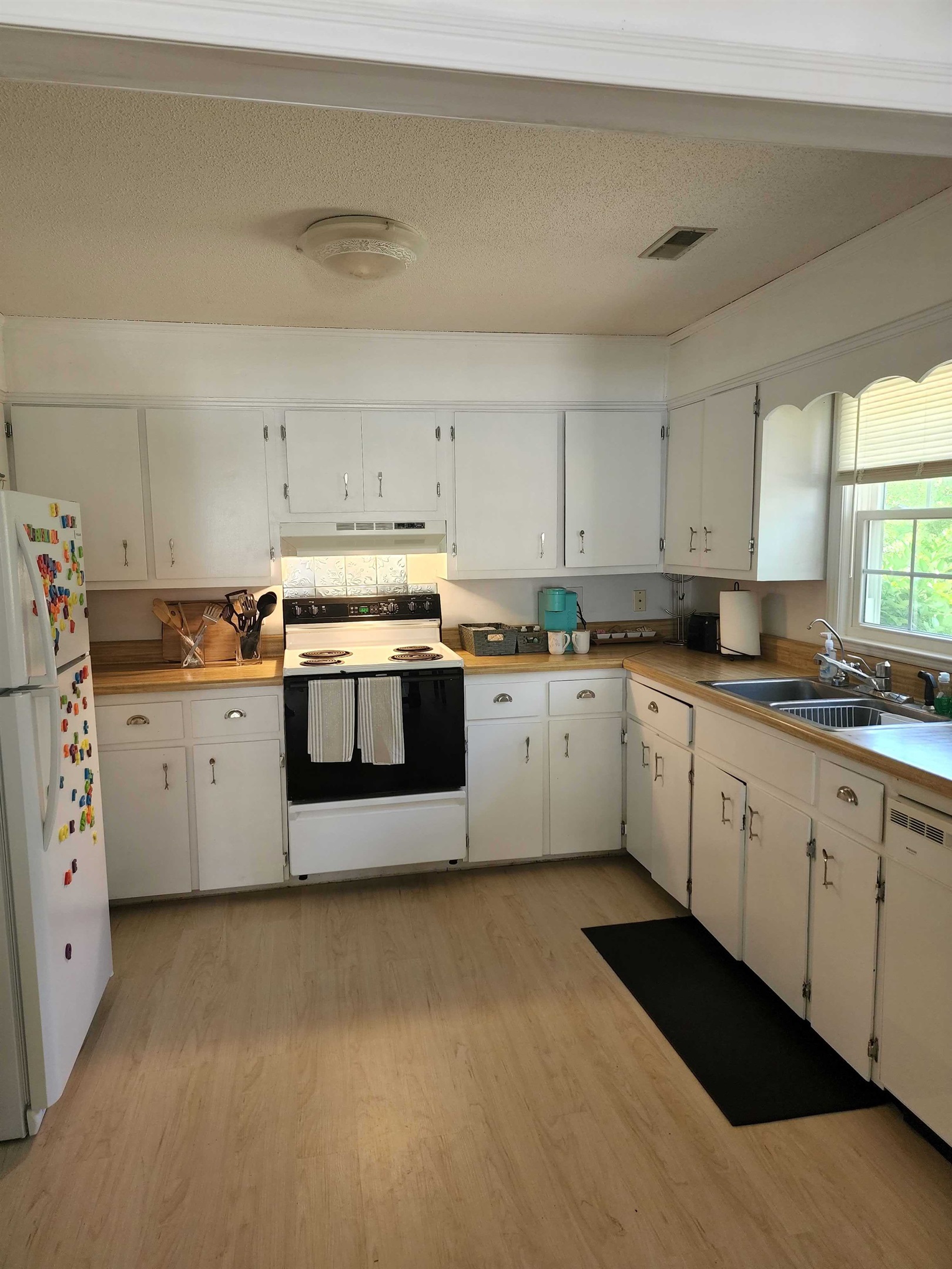 Well-Equipped Kitchen Ready for Your Culinary Adventures.