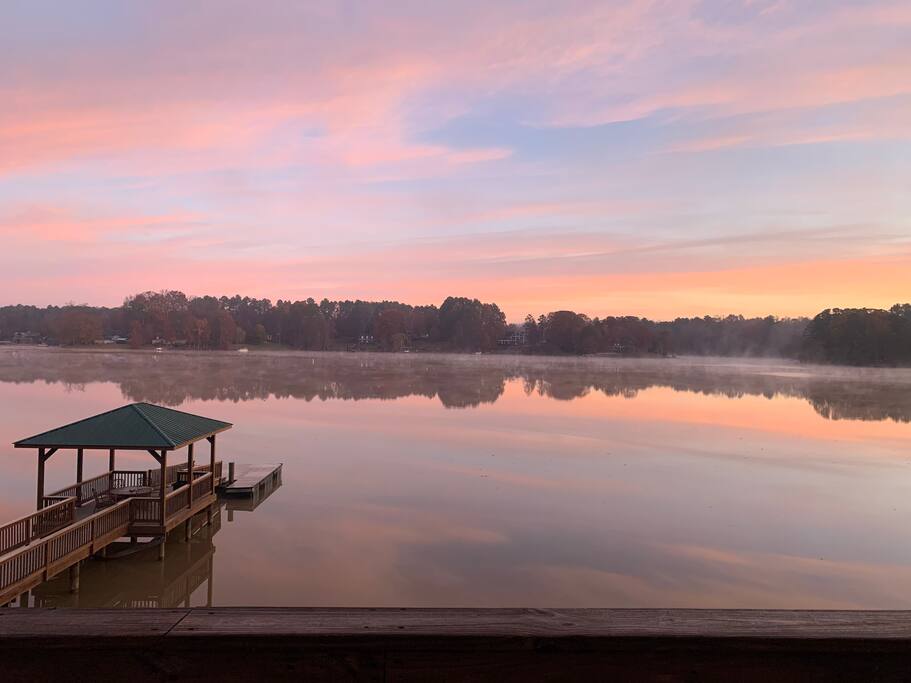 Sunrise from master bedroom balcony on second floor (no filter) Sunrise from master bedroom balcony on second floor (no filter) - Camm’s Lakeside Retreat (Close to Charlotte) - Belmont