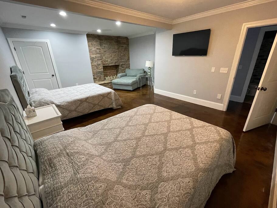Located on the lower level walk-out basement, this bedroom is across from a full bathroom and typically stays cooler. Plus, the game room activities are just around the corner for added fun! Located on the lower level walk-out basement, this bedroom is across from a full bathroom and typically stays cooler. Plus, the game room activities are just around the corner for added fun! - Chalet on Lake Wylie, Waterfront w/Beach/Sleeps 16 - Belmont