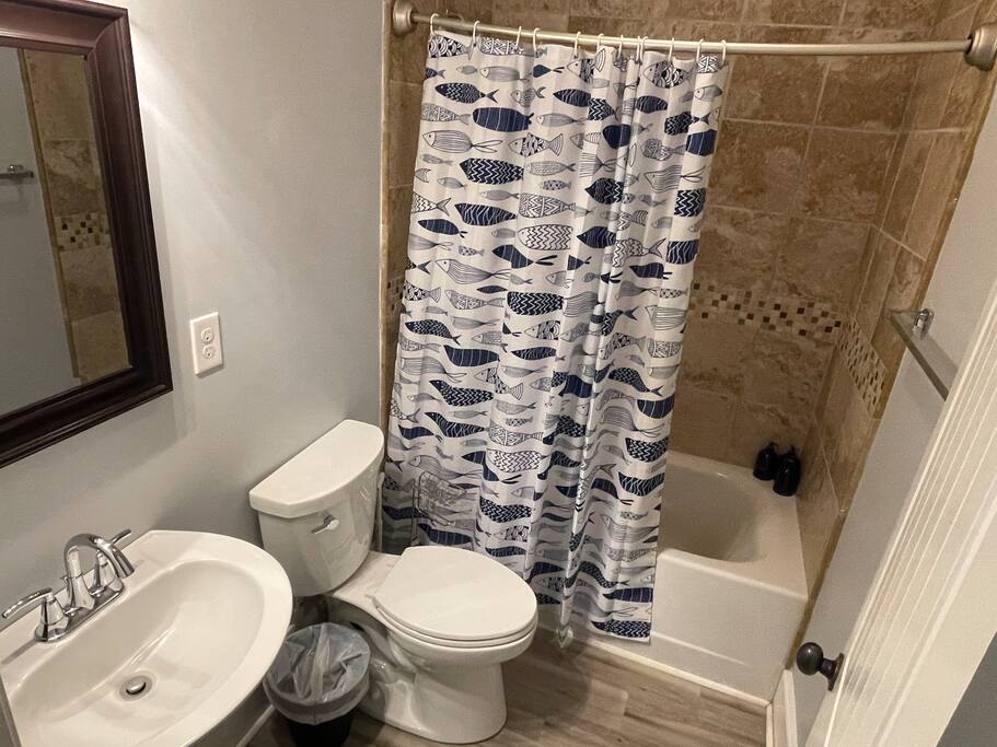 Full bathroom located across the hallway from the double queen room in the walkout basement Full bathroom located across the hallway from the double queen room in the walkout basement - Chalet on Lake Wylie, Waterfront w/Beach/Sleeps 16 - Belmont