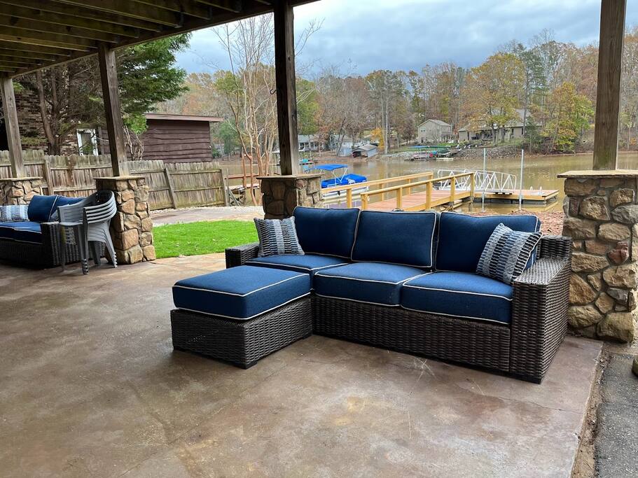 Our outdoor spaces are great for gatherings. You'll find comfortable seating areas where you can enjoy beautiful lake views. A large stainless steel propane grill (not pictured) is available for cookouts, making outdoor grilling easy. Our outdoor spaces are great for gatherings. You'll find comfortable seating areas where you can enjoy beautiful lake views. A large stainless steel propane grill (not pictured) is available for cookouts, making outdoor grilling easy. - Chalet on Lake Wylie, Waterfront w/Beach/Sleeps 16 - Belmont