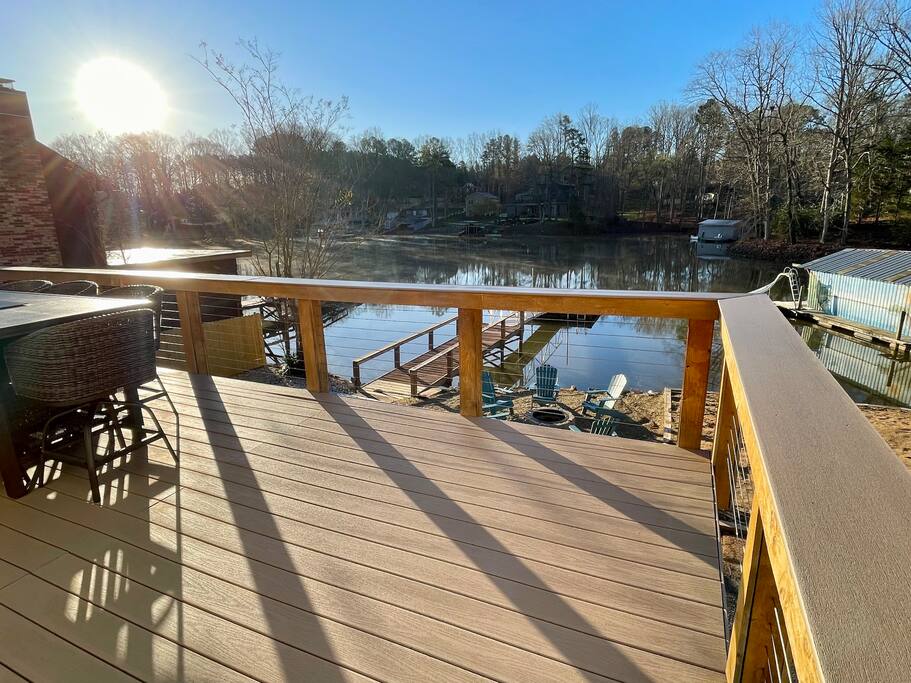 The morning sun shines overhead, inviting you to step outside and enjoy the peaceful views of the lake. The morning sun shines overhead, inviting you to step outside and enjoy the peaceful views of the lake. - Chalet on Lake Wylie, Waterfront w/Beach/Sleeps 16 - Belmont