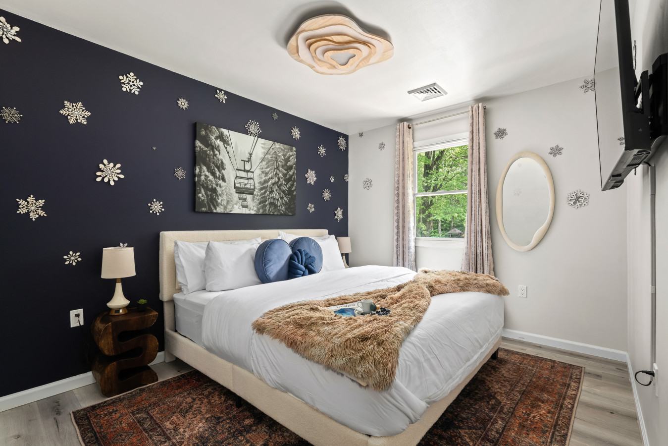Cozy King Bed in a Winter-Inspired Retreat—Ideal for a Restful Night’s Sleep