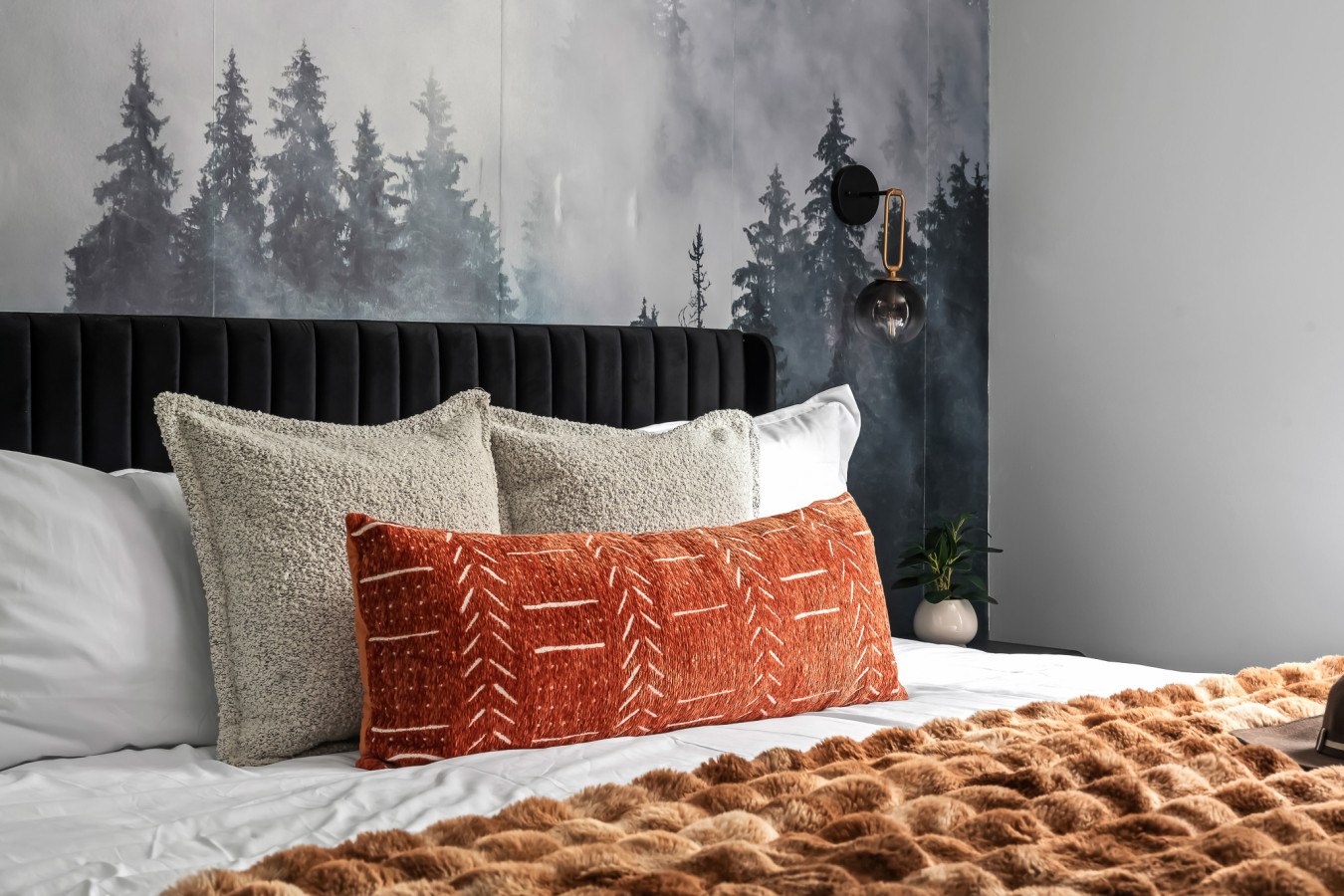 Unwind in a plush king bed, surrounded by serene, mountain vibes.