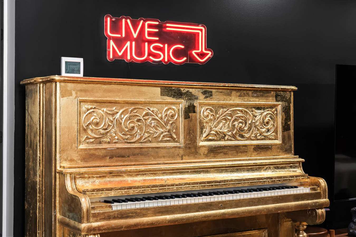 Add a touch of elegance to your stay with this beautiful golden piano in the living area – perfect for music lovers or a serene moment of relaxation.