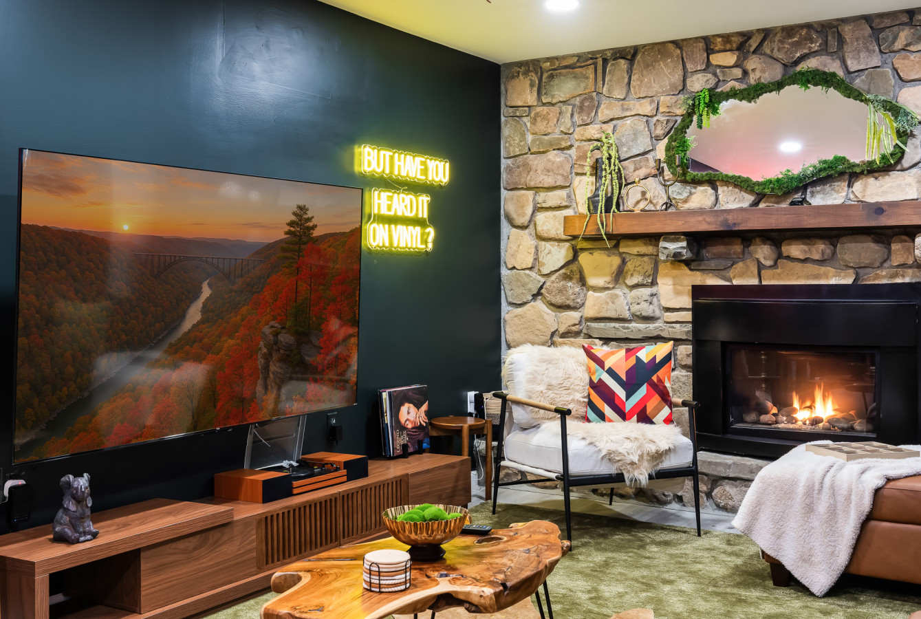 Relax in comfort with cozy seating and a large TV – perfect for unwinding after a day of adventure or enjoying a movie night with loved ones.