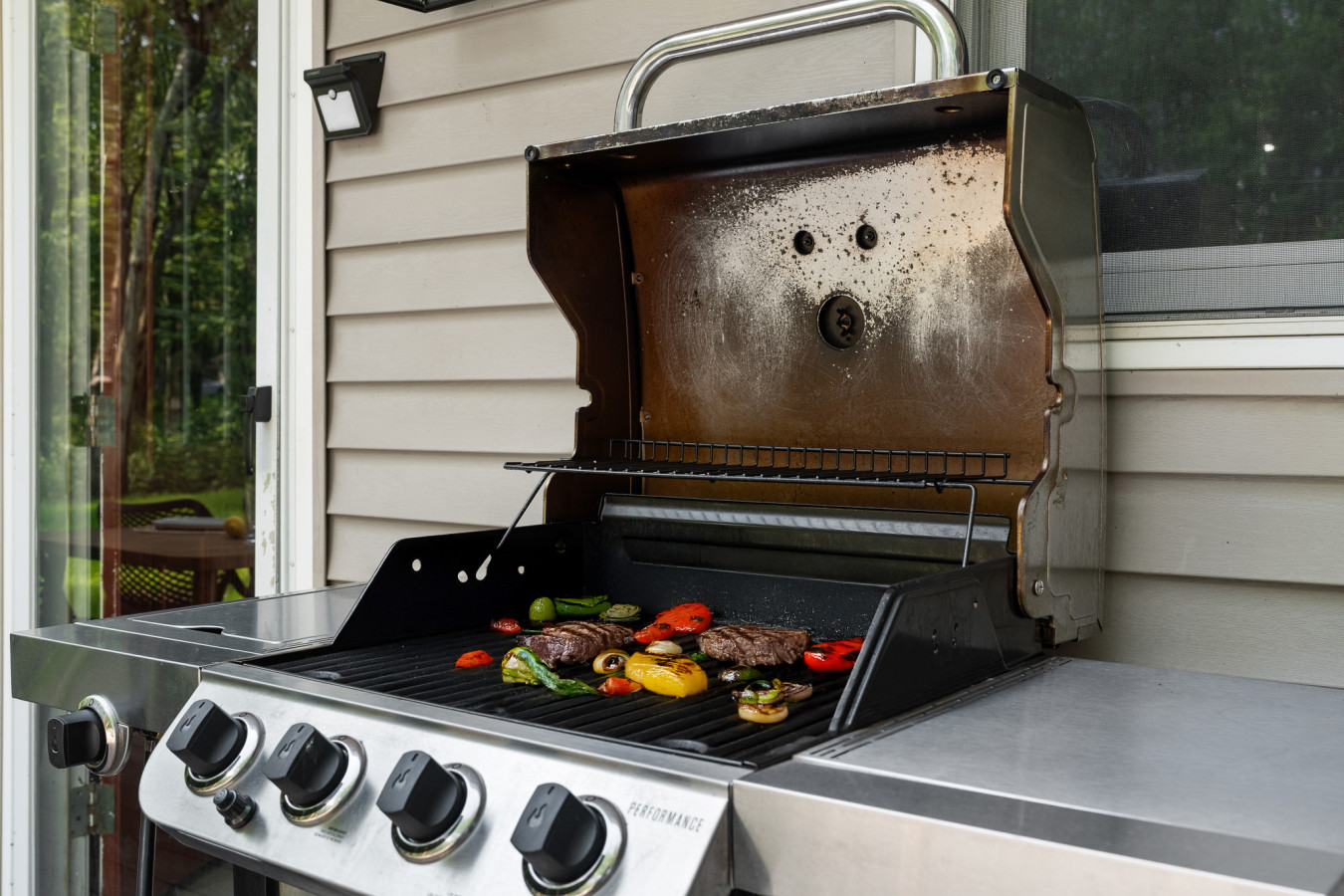 Fire up the grill and enjoy a delicious BBQ with family and friends in our spacious outdoor setting. Perfect for al fresco dining!